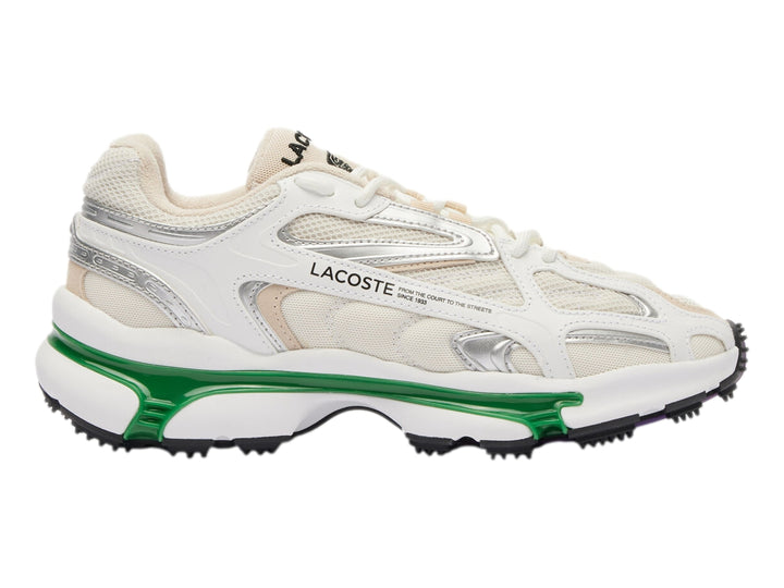 Tenis deportivos Lacoste blancos con detalles plateados y suela gruesa en color verde y blanco.