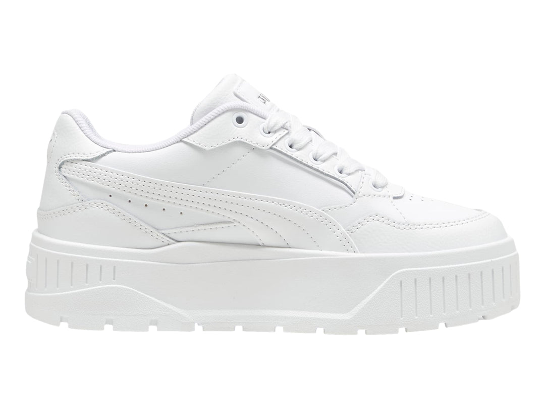 Tenis PUMA Carmen II Idol JR en color blanco con suela de plataforma gruesa y detalles en plata.