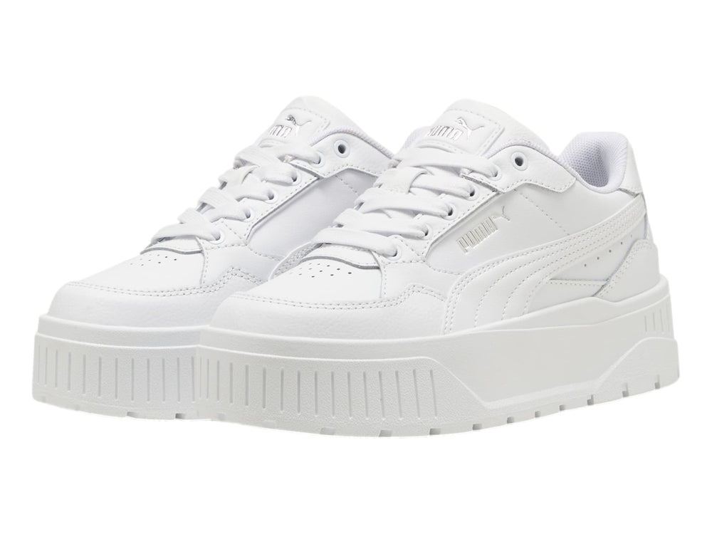 Tenis PUMA Carmen II Idol JR en color blanco con suela de plataforma gruesa y detalles en plata.
