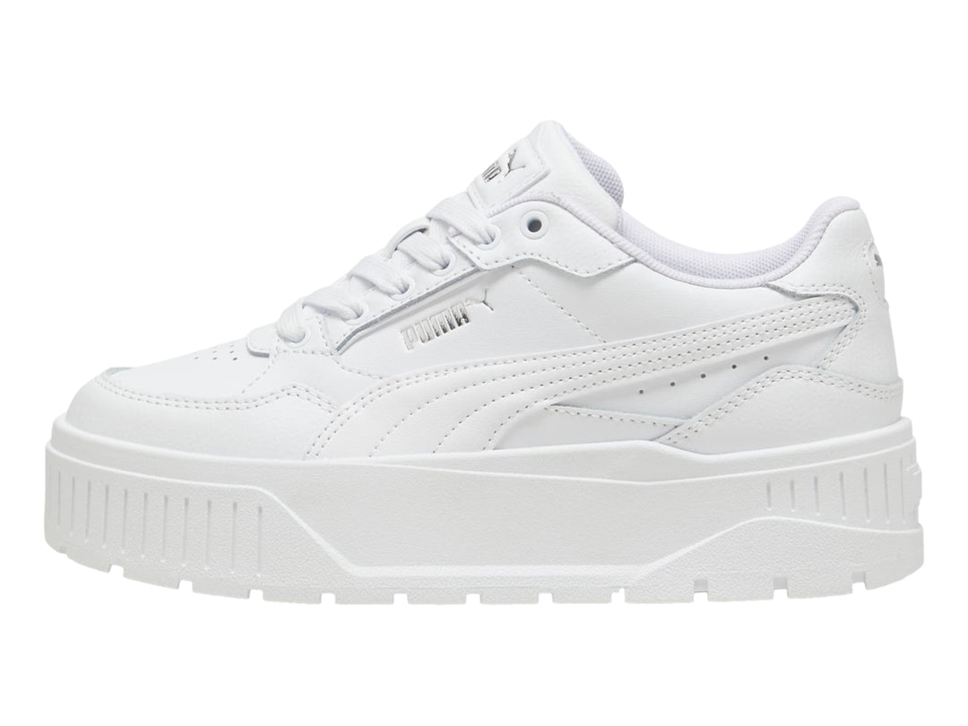Tenis PUMA Carmen II Idol JR en color blanco con suela de plataforma gruesa y detalles en plata.