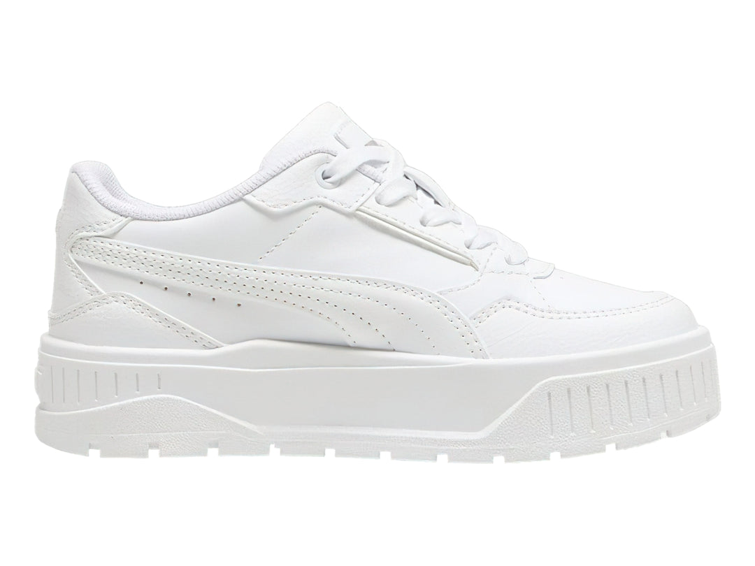 Tenis PUMA blancos con suela de plataforma gruesa para niños.
