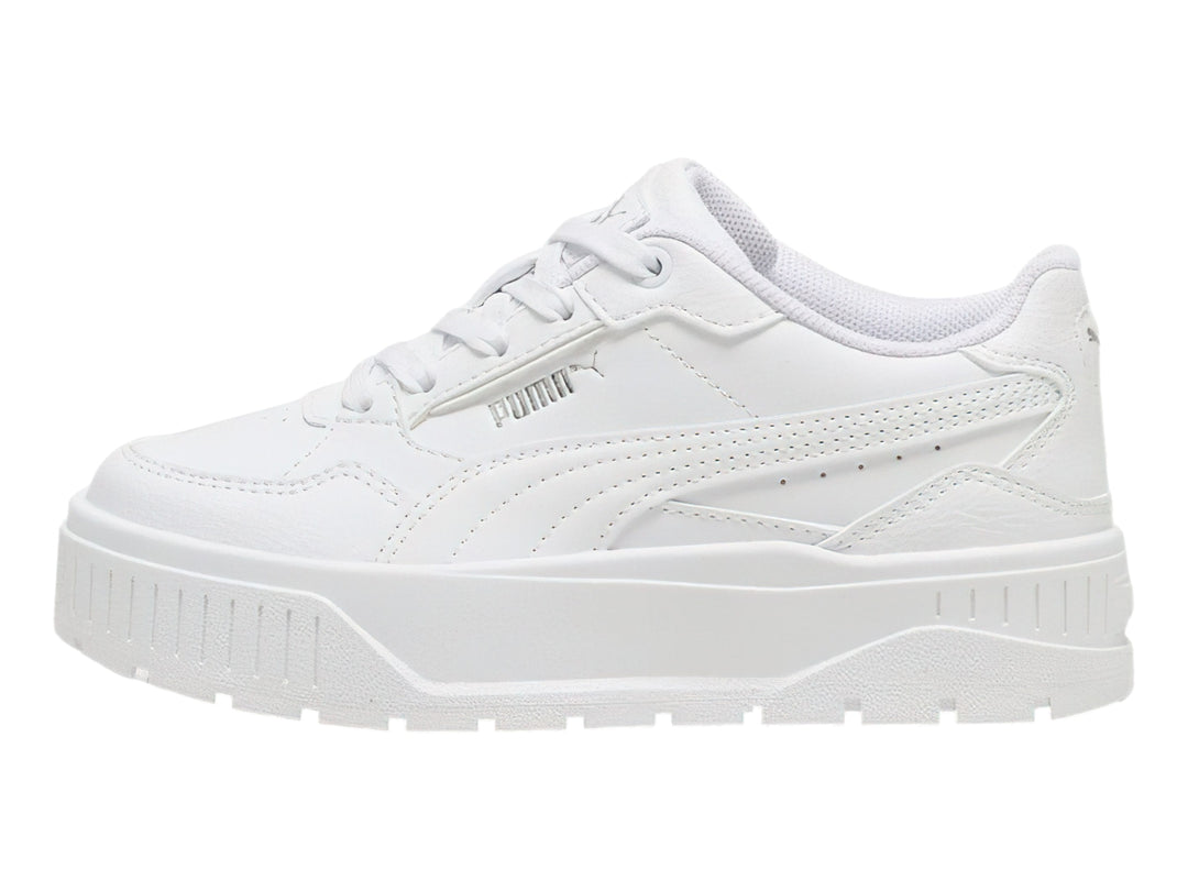 Tenis PUMA blancos con suela de plataforma gruesa para niños.