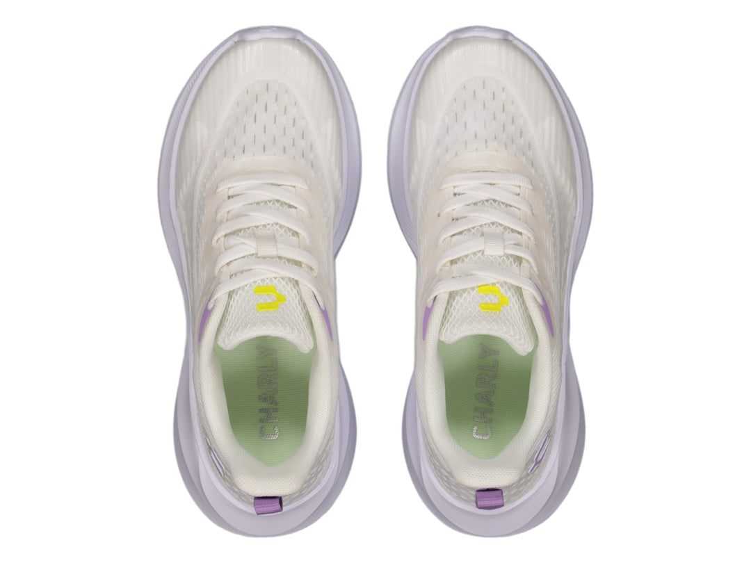 Tenis deportivos Charly en color blanco con detalles en lila, diseño ligero y moderno para deporte.