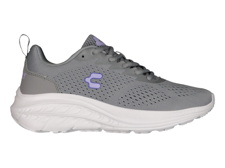 Tenis deportivos Charly en color gris con suela blanca y detalles en lila.