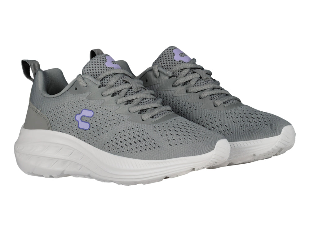Tenis deportivos Charly en color gris con suela blanca y detalles en lila.