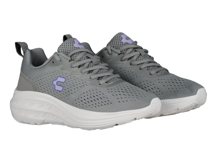 Tenis deportivos Charly en color gris con suela blanca y detalles en lila.