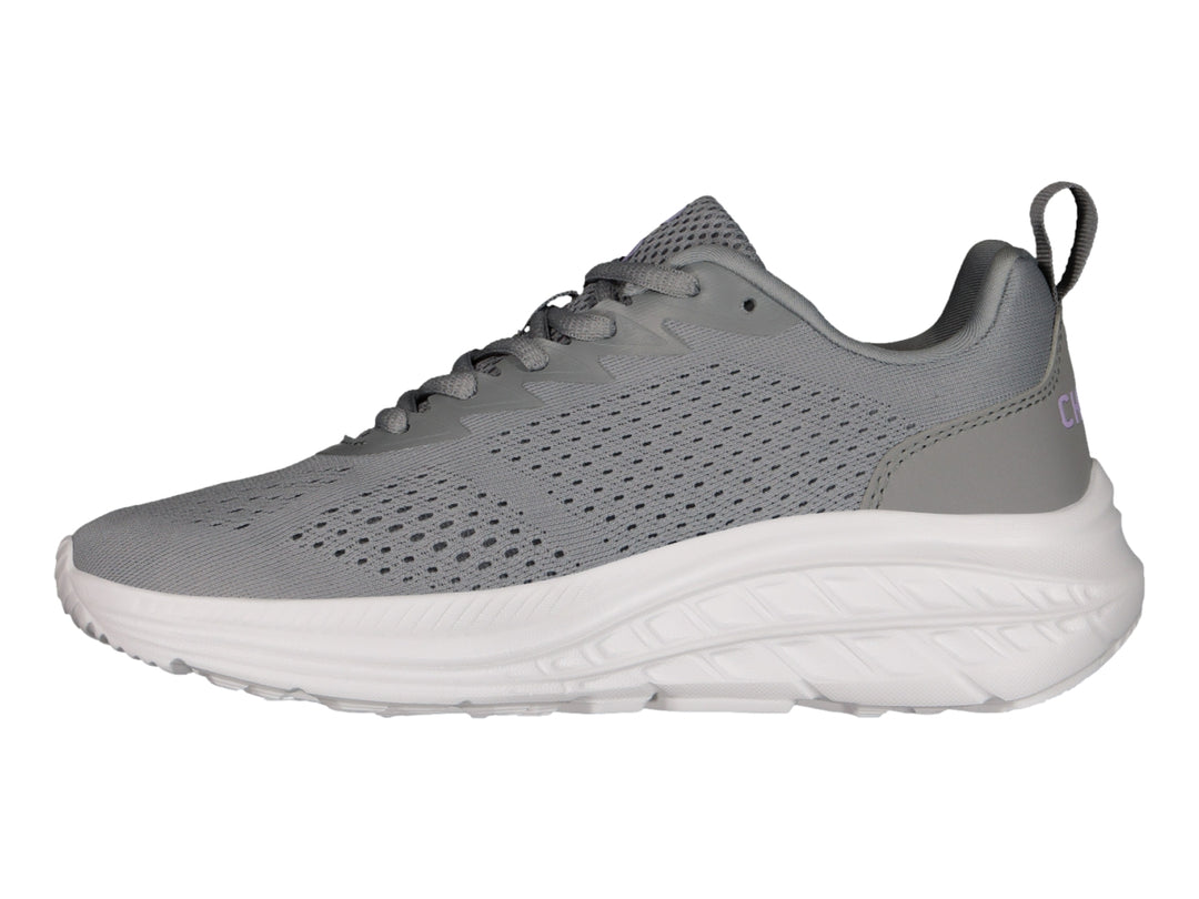 Tenis deportivos Charly en color gris con suela blanca y detalles en lila.