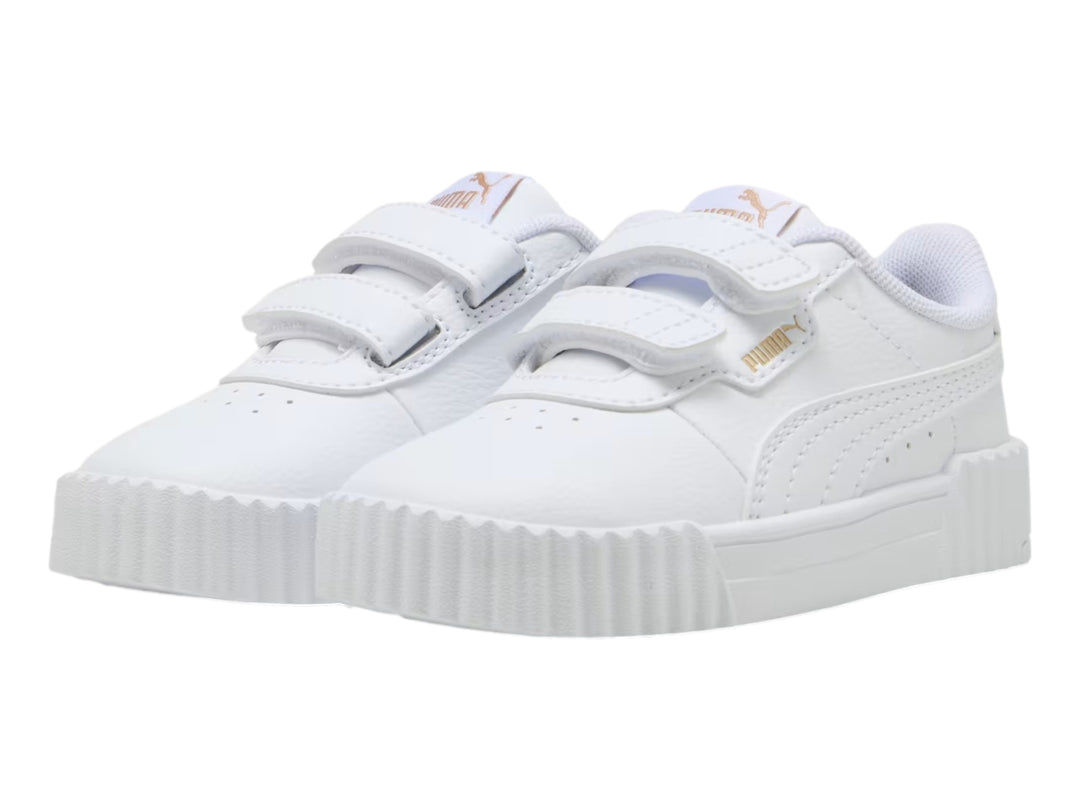 Tenis PUMA Carina 3.0 V infantiles en color blanco con cierre de velcro y suela de plataforma.