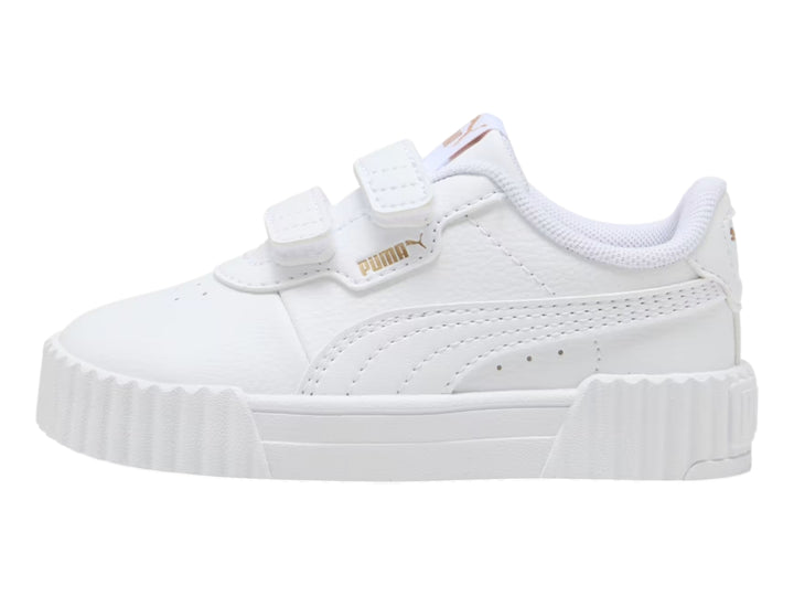 Tenis PUMA Carina 3.0 V infantiles en color blanco con cierre de velcro y suela de plataforma.
