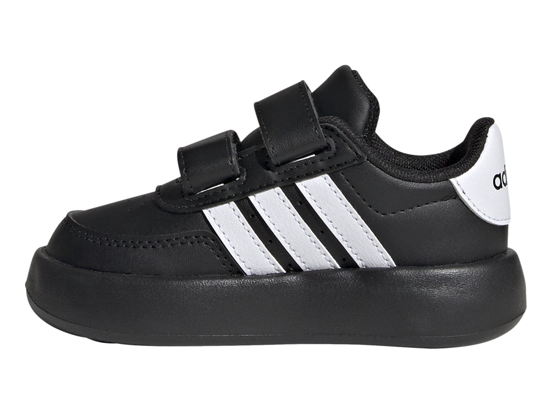 Tenis Adidas Breaknet 2.0 color negro con tres franjas blancas y cierre de velcro.