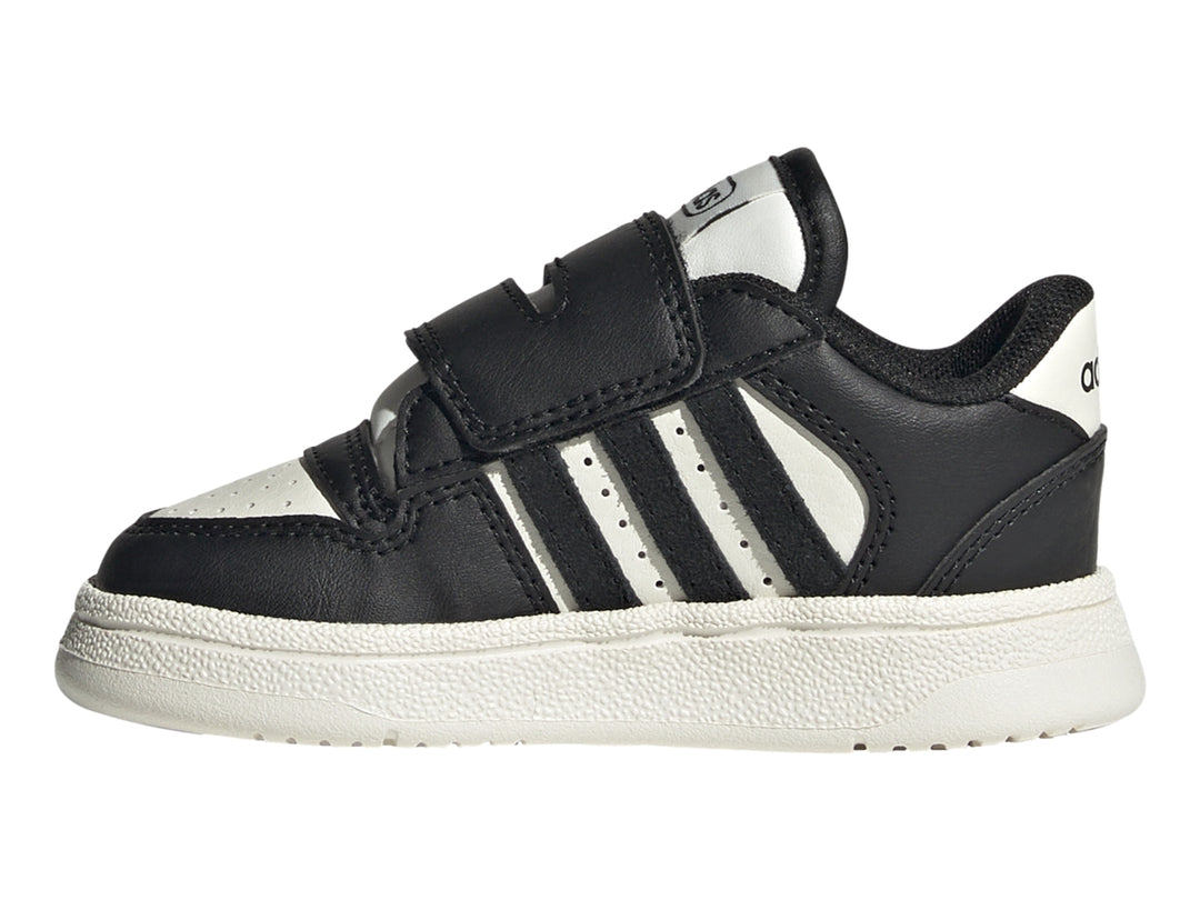 Tenis Adidas Break Start para niño en color negro con tres franjas blancas y cierre de velcro.