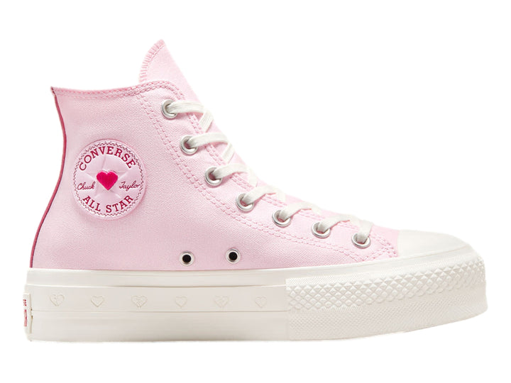 Tenis Converse botín color rosa con suela blanca y detalles decorativos.