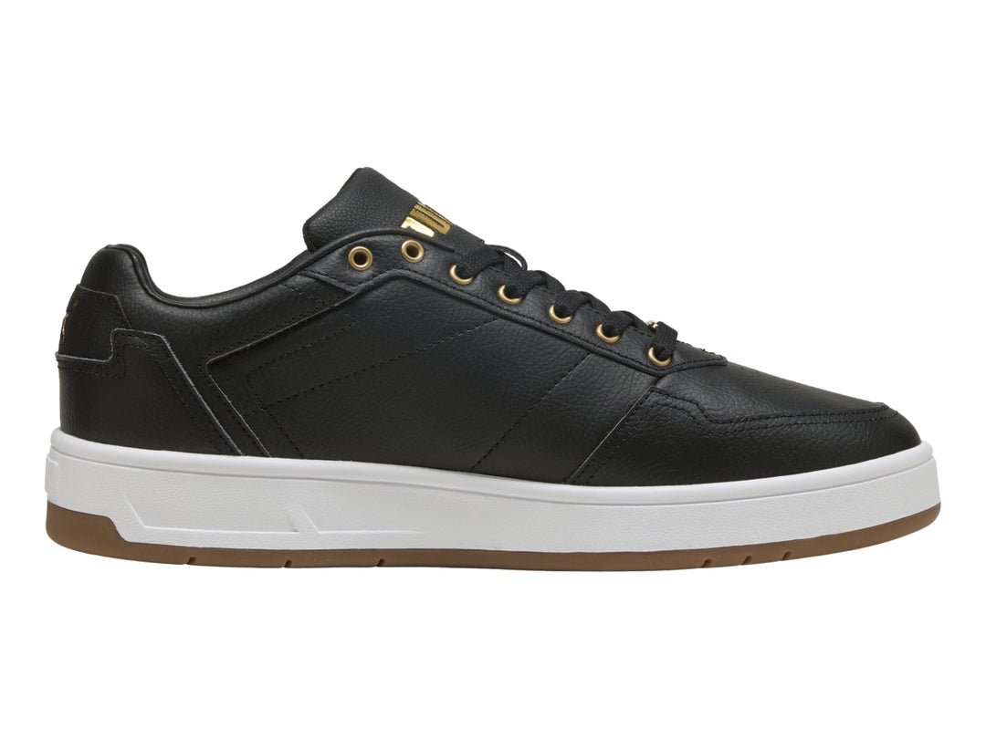 Tenis PUMA Court Classic Lux color negro con suela blanca y detalles en dorado.