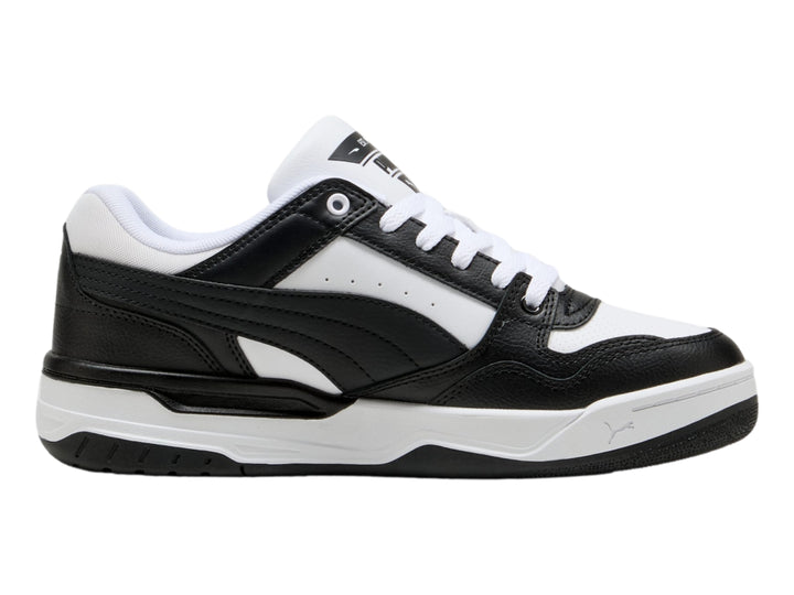Tenis PUMA Rebound Retro en colores blanco y negro con suela blanca y detalles negros.