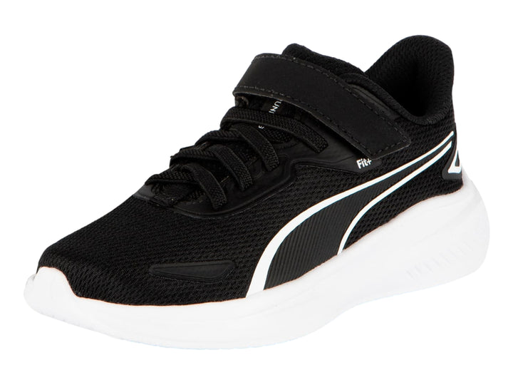 Tenis PUMA negros con suela blanca y correa de ajuste para niños.