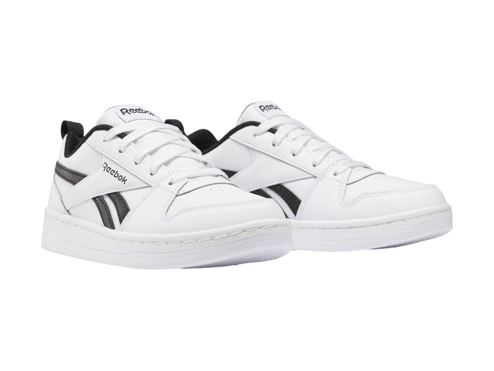 Tenis Reebok blancos con detalles en negro, diseño deportivo de corte bajo para niños.