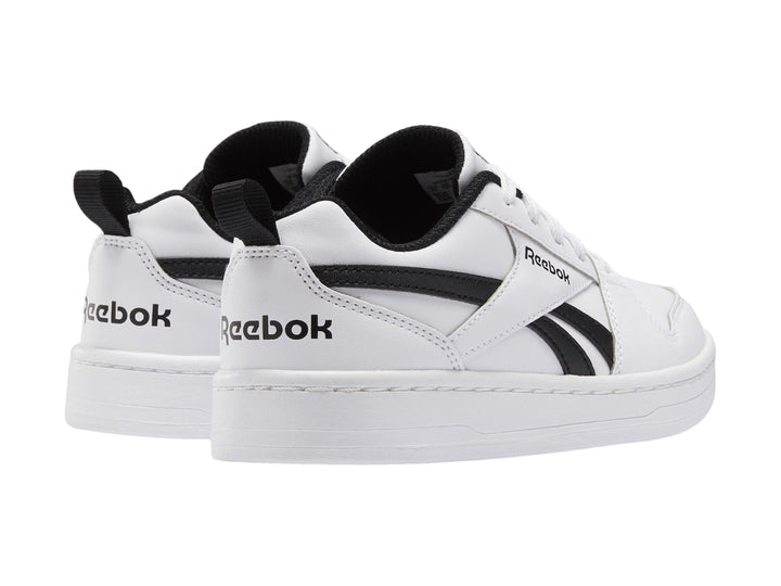 Tenis Reebok blancos con detalles en negro, diseño deportivo de corte bajo para niños.