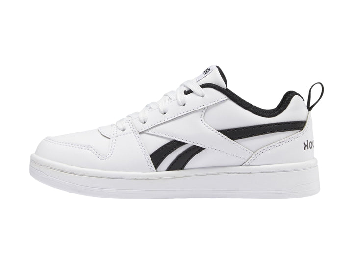 Tenis Reebok blancos con detalles en negro, diseño deportivo de corte bajo para niños.