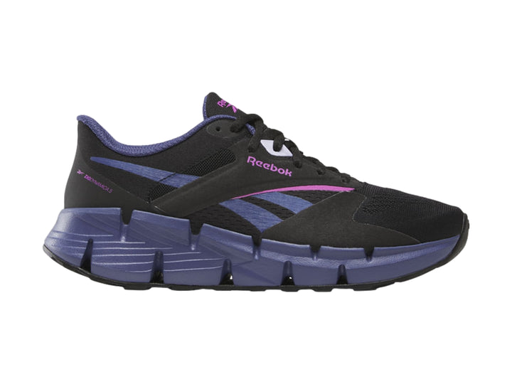 Tenis deportivos Reebok Zig Dynamica 5 en color negro con detalles en morado y rosa.