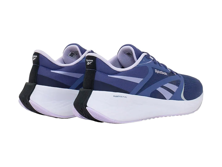 Tenis deportivos Reebok color azul con suela blanca y detalles en azul claro.