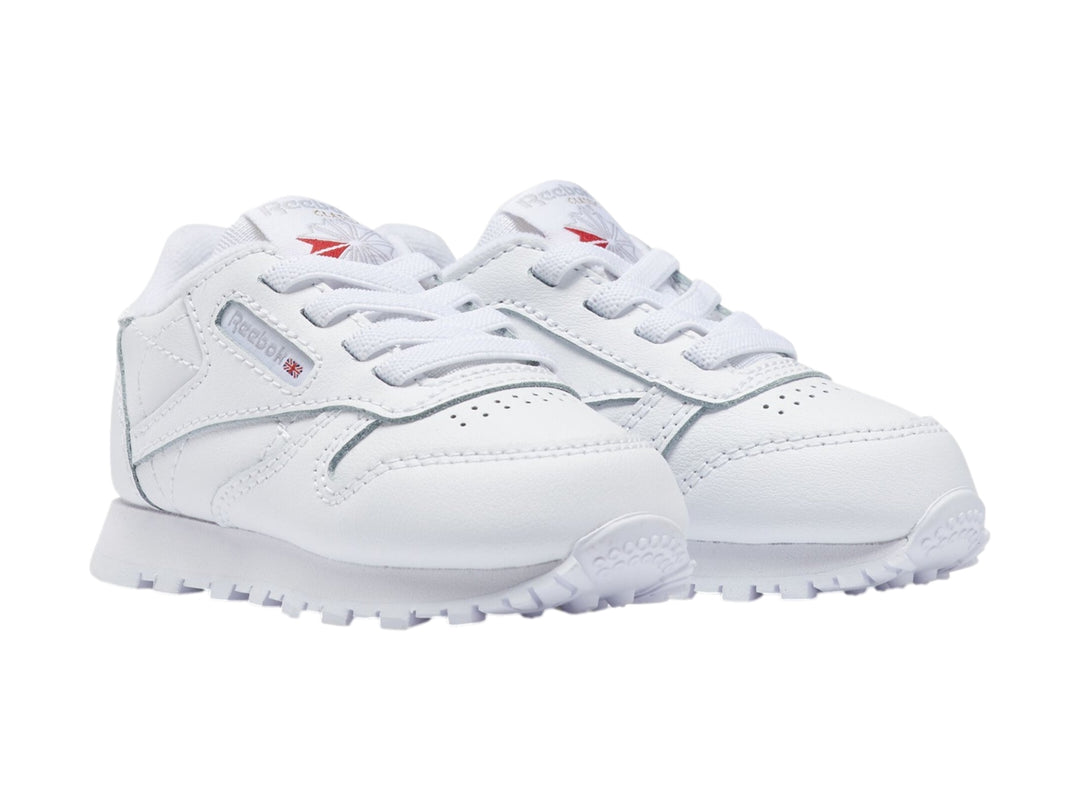 Tenis blancos Reebok Classic Leather de corte bajo para niño o bebé.
