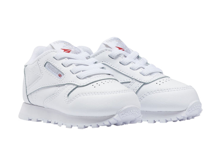Tenis blancos Reebok Classic Leather de corte bajo para niño o bebé.