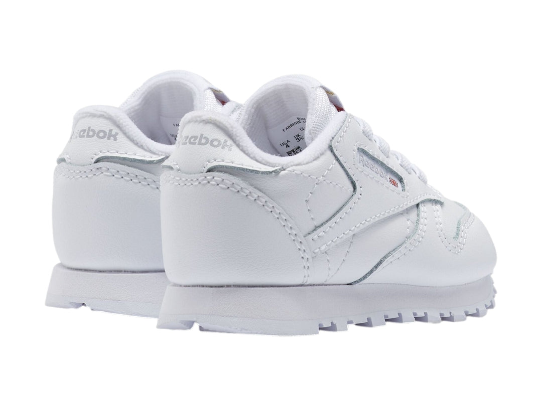 Tenis blancos Reebok Classic Leather de corte bajo para niño o bebé.