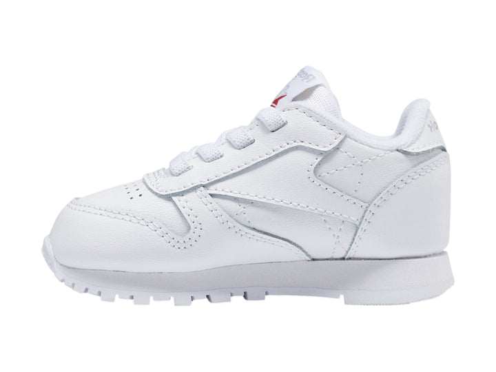 Tenis blancos Reebok Classic Leather de corte bajo para niño o bebé.