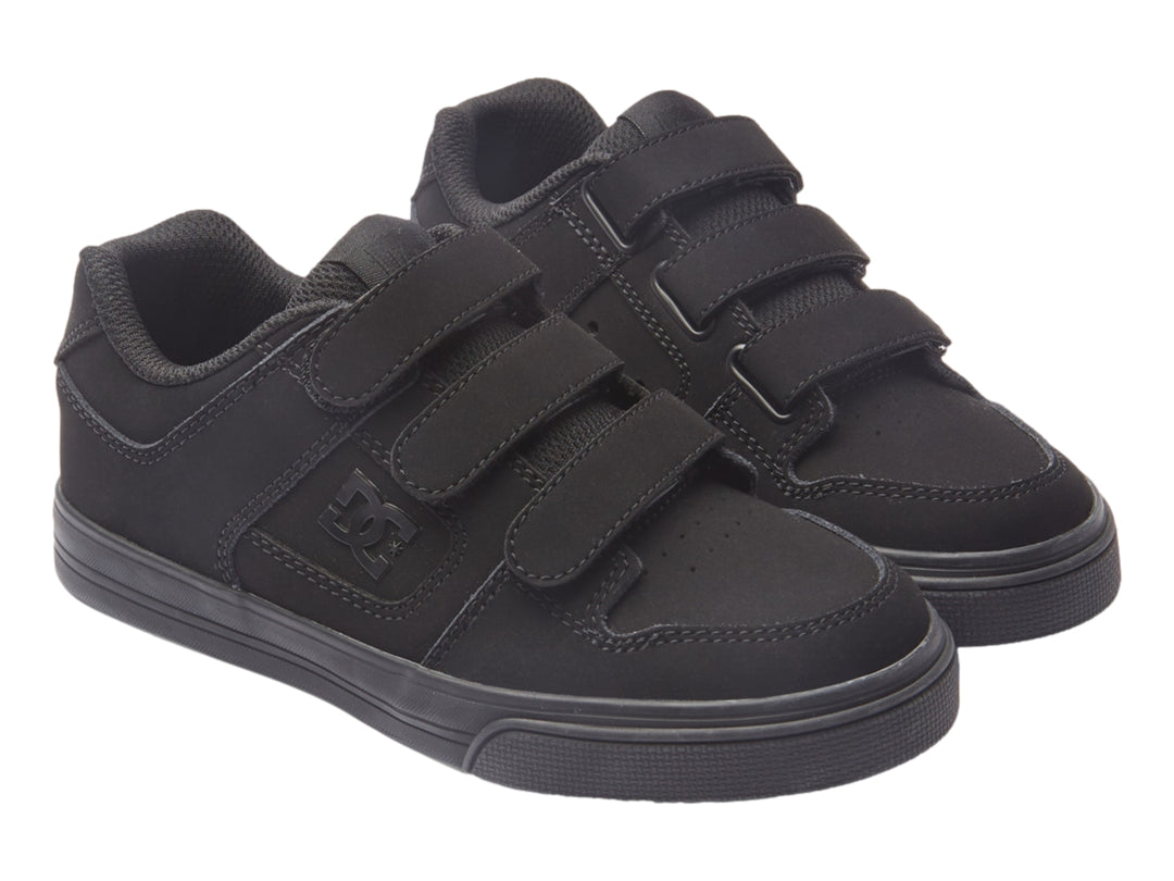 Zapato deportivo DC Shoes color negro con cierre de tres tiras de velcro.