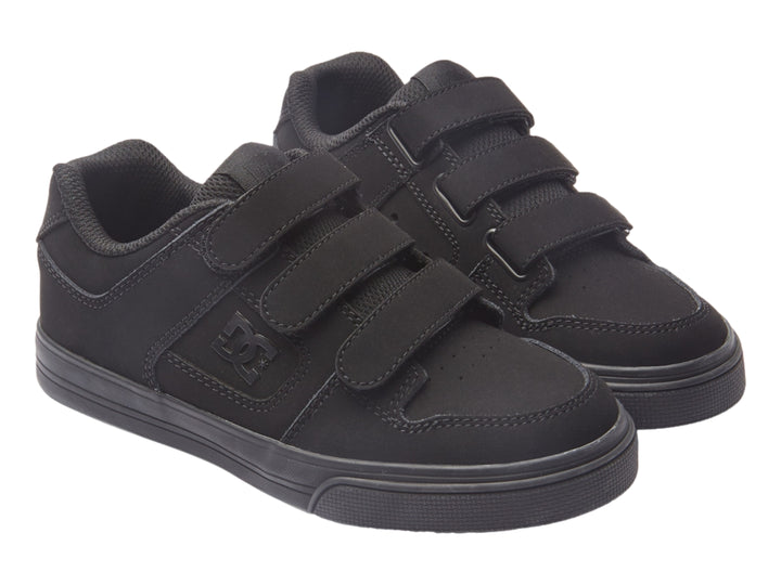 Zapato deportivo DC Shoes color negro con cierre de tres tiras de velcro.