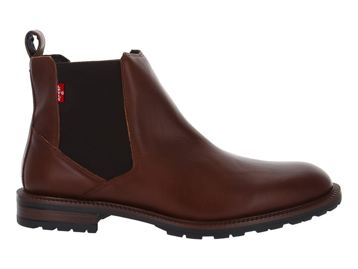 Bota estilo Chelsea color caoba con suela negra y panel lateral elástico.