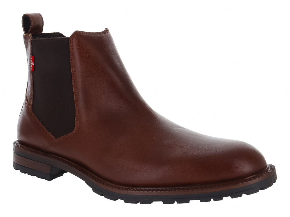 Bota estilo Chelsea color caoba con suela negra y panel lateral elástico.