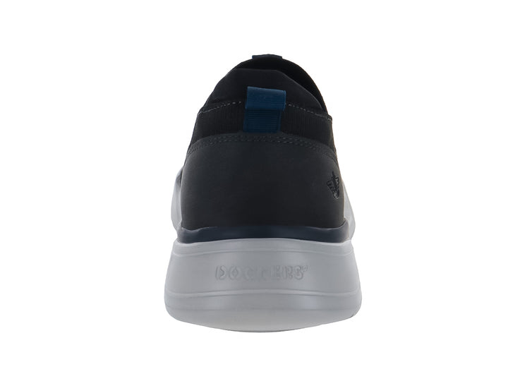 Zapato casual Dockers modelo Newport en color negro con suela gris y diseño slip-on de tela tejida.