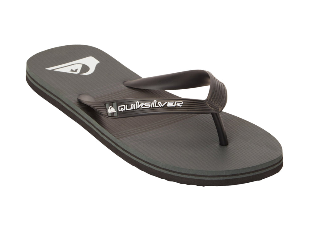 Sandalias Quiksilver de color gris oscuro con diseño plano y correa sintética.