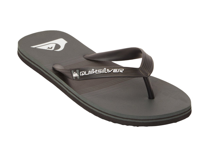 Sandalias Quiksilver de color gris oscuro con diseño plano y correa sintética.