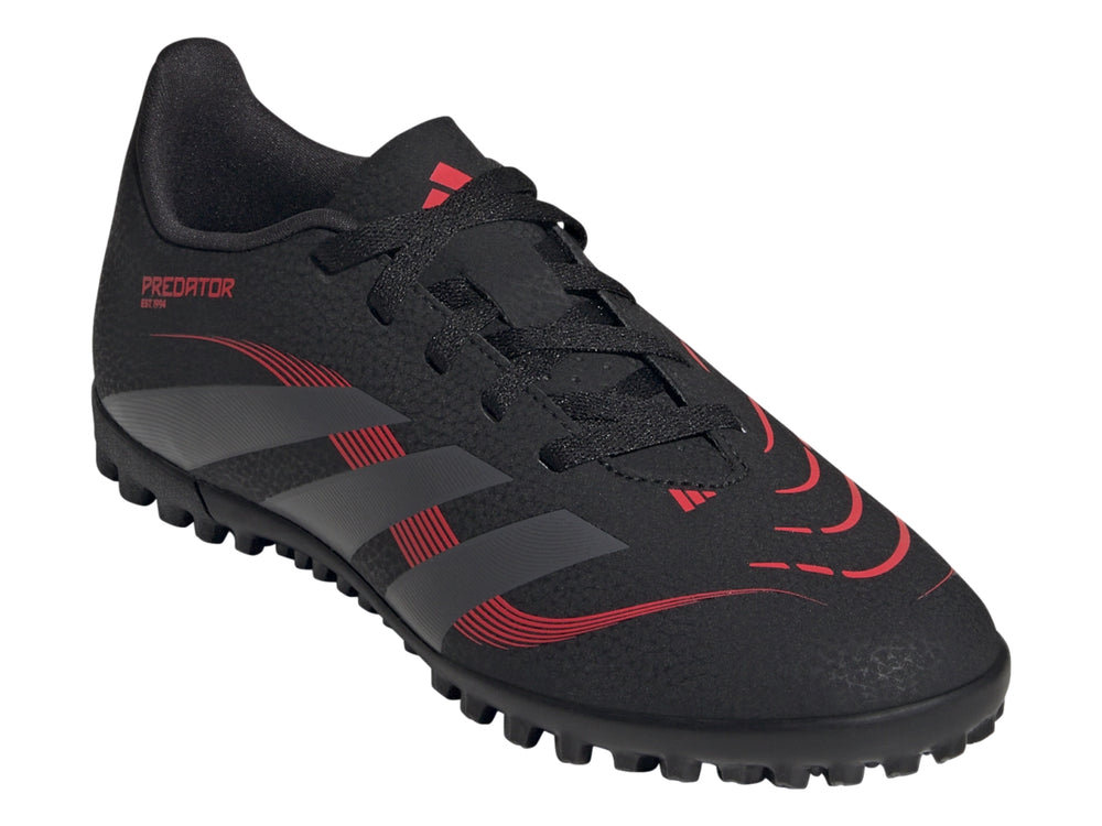 Calzado de fútbol Adidas Predator en color negro con franjas grises y detalles rojos para pasto sintético.