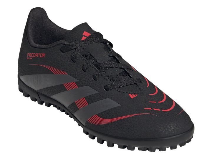Calzado de fútbol Adidas Predator en color negro con franjas grises y detalles rojos para pasto sintético.
