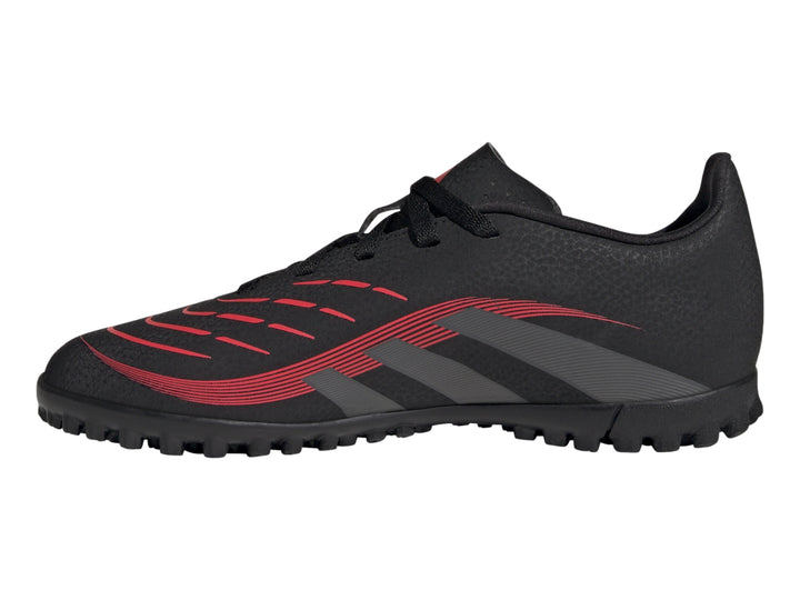 Calzado de fútbol Adidas Predator en color negro con franjas grises y detalles rojos para pasto sintético.