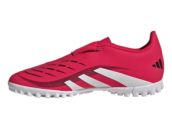 Zapato de fútbol Adidas Predator color rojo con franjas blancas y suela blanca para terreno sintético.