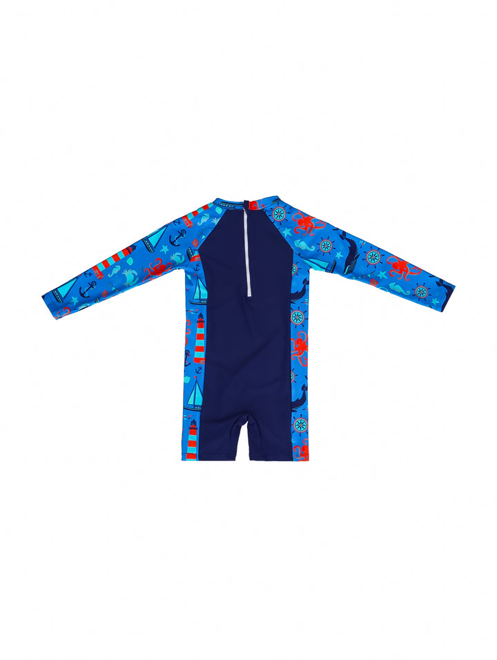 Traje de baño de una pieza manga larga para niño en color azul marino con estampados náuticos.