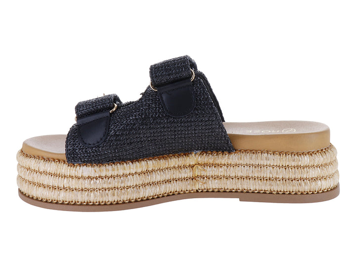 Sandalias de plataforma color negro con suela de yute tejido y hebillas doradas.