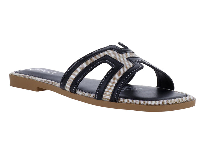 Sandalia plana ROZE en colores negro y beige con diseño de tiras transversales.
