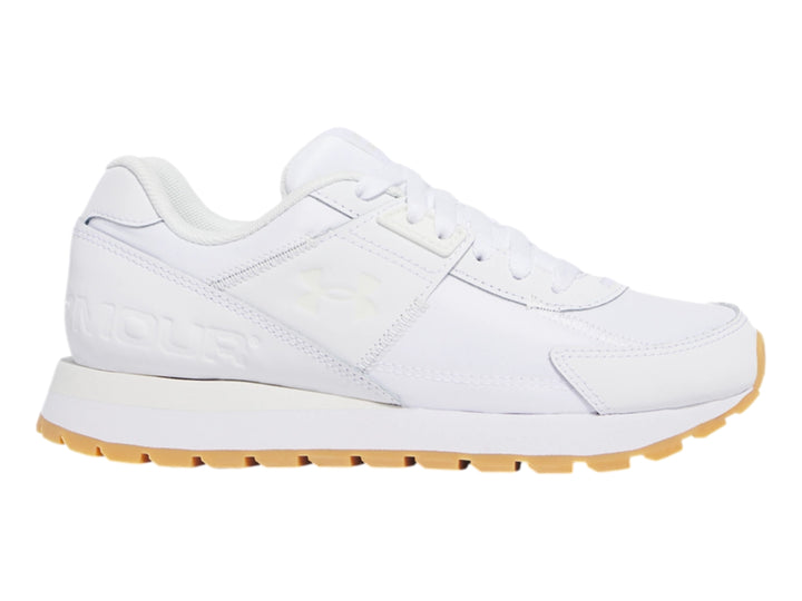Tenis deportivos Under Armour color blanco con suela de goma color miel.