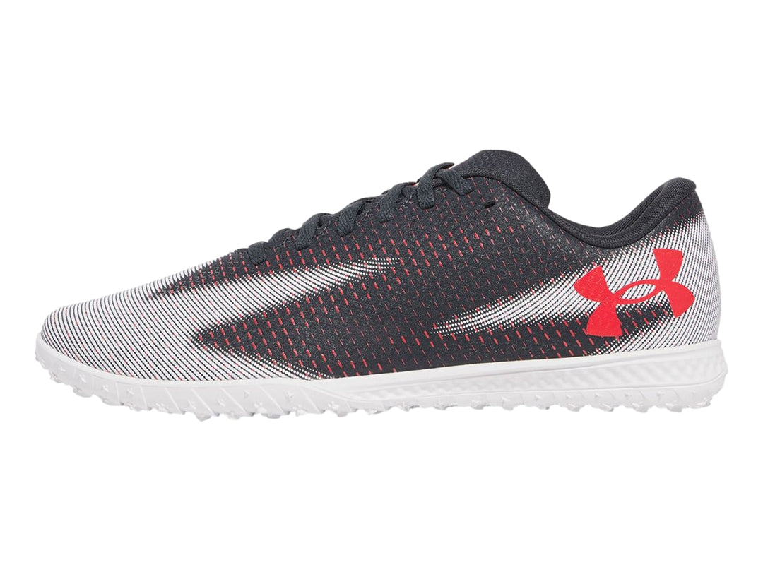 Zapato de fútbol Under Armour Shadow Select 3 Turf en color gris con suela blanca y detalles en rojo.