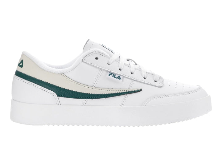 Tenis FILA blancos con franjas verde y beige, diseño deportivo de corte bajo.