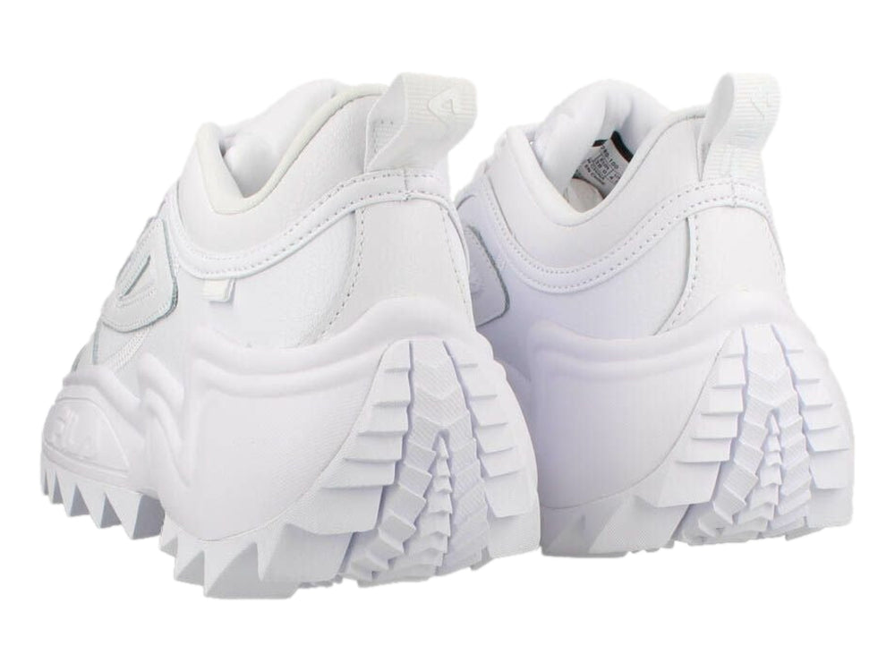 Tenis FILA Twister en color blanco total con suela gruesa y dentada de estilo deportivo moderno.