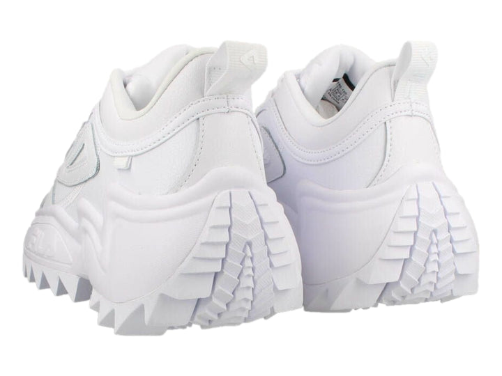 Tenis FILA Twister en color blanco total con suela gruesa y dentada de estilo deportivo moderno.