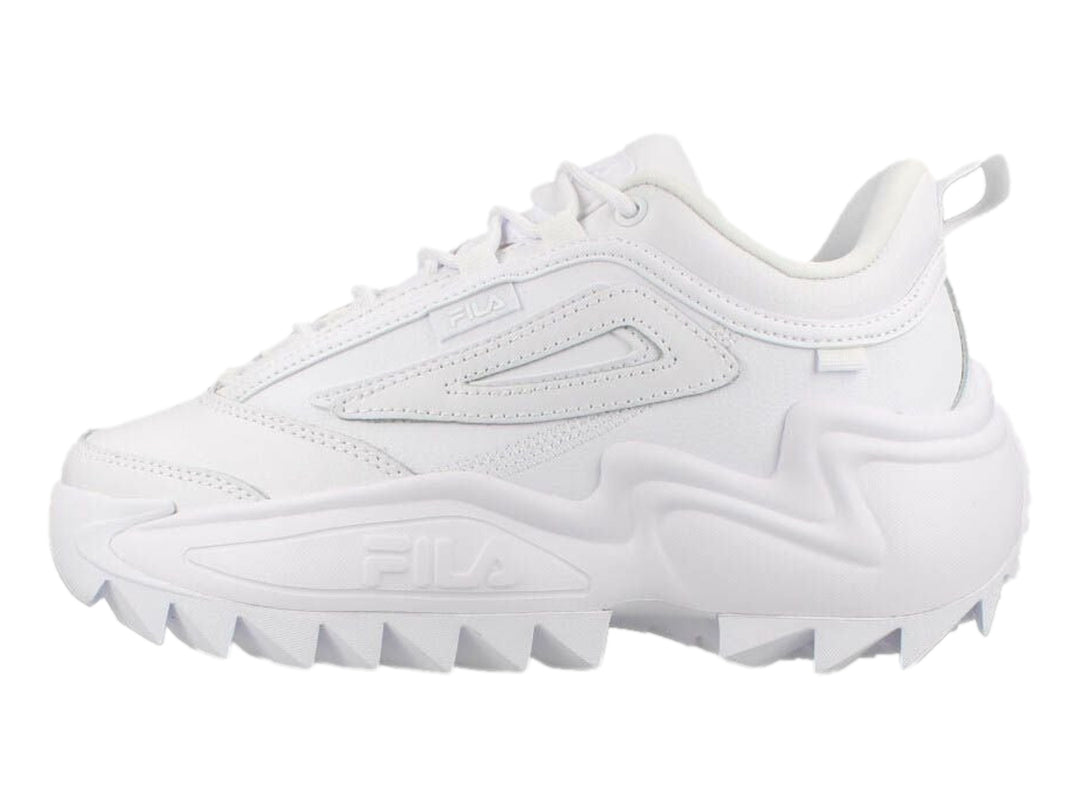 Tenis FILA Twister en color blanco total con suela gruesa y dentada de estilo deportivo moderno.