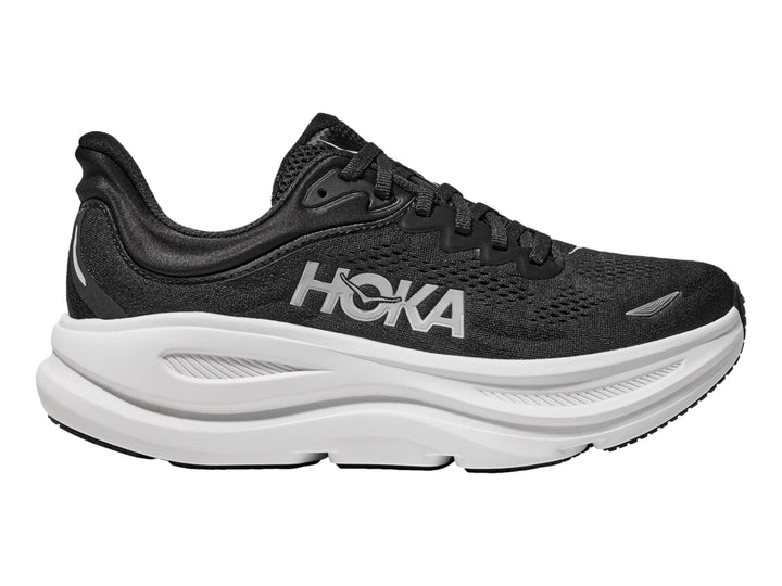Tenis deportivos HOKA Bondi 9 en color negro con suela blanca ancha y logo lateral blanco.