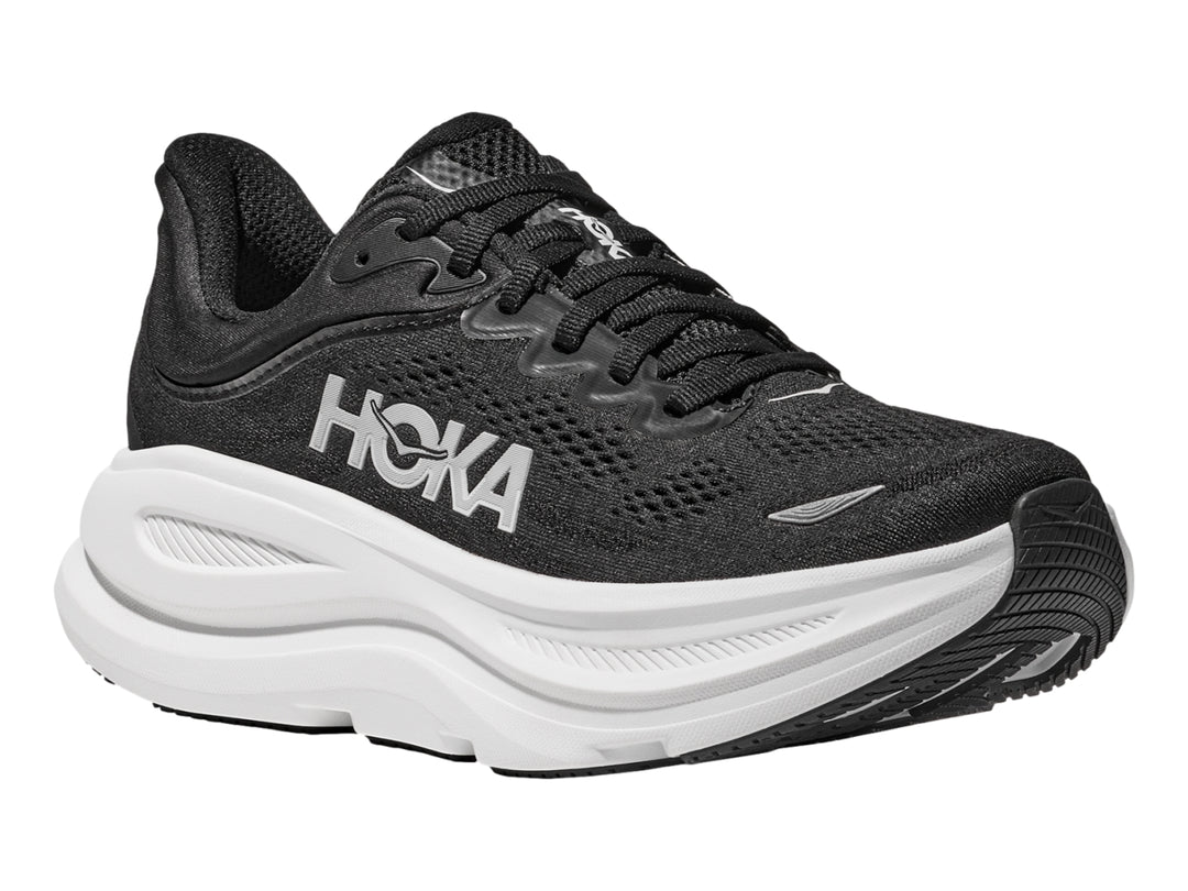 Tenis deportivos HOKA Bondi 9 en color negro con suela blanca ancha y logo lateral blanco.